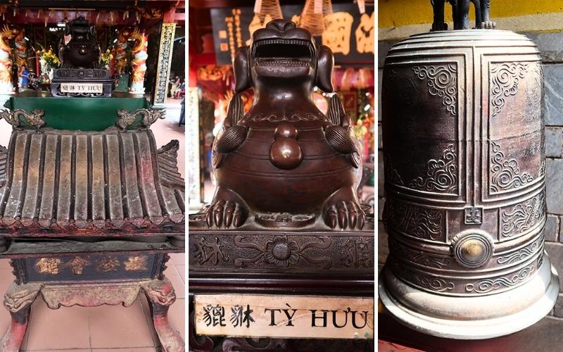 Énorme brûleur d'encens avec toit, Pixiu et cloche ancienne dans le hall de la pagode Quan Am